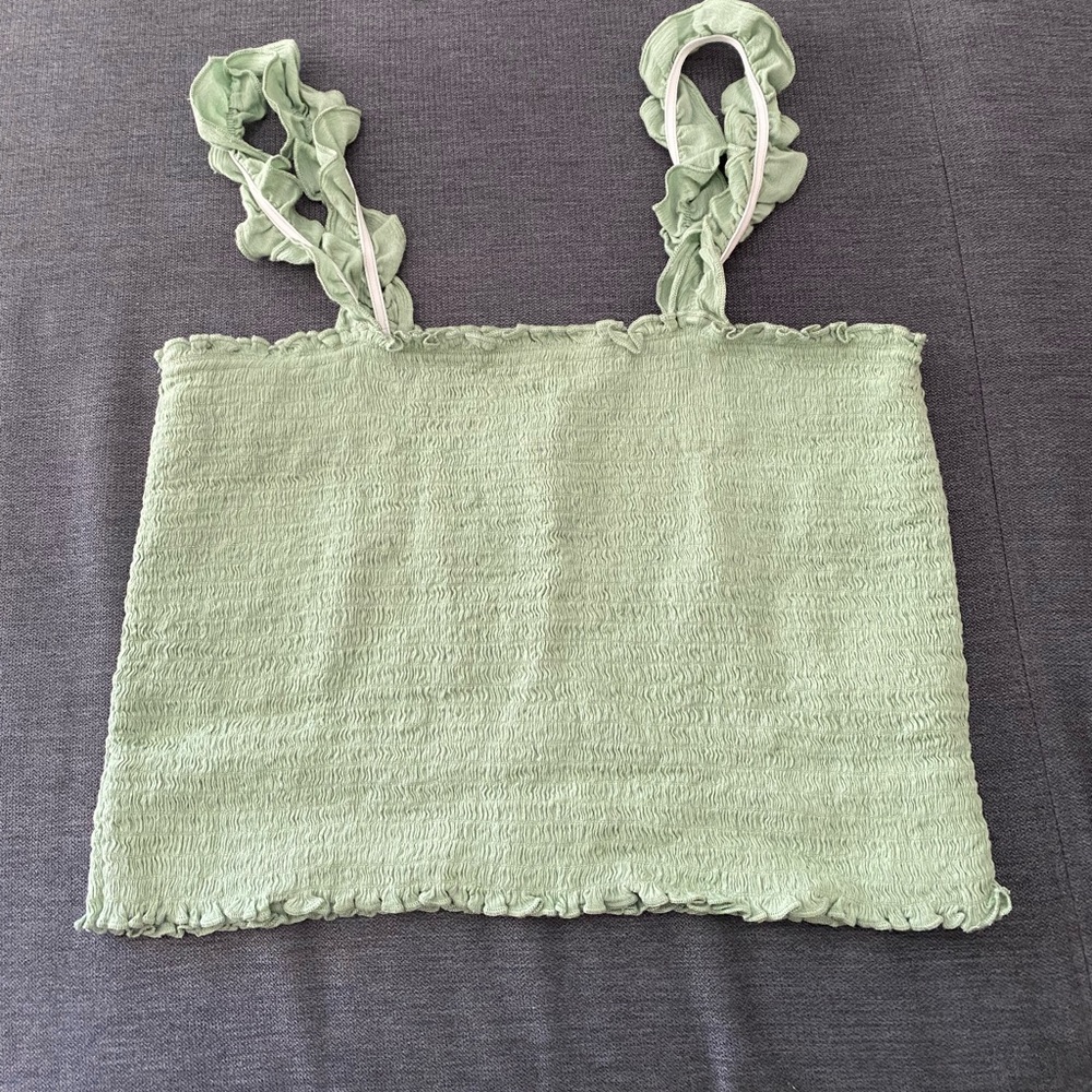 Frilly green top
